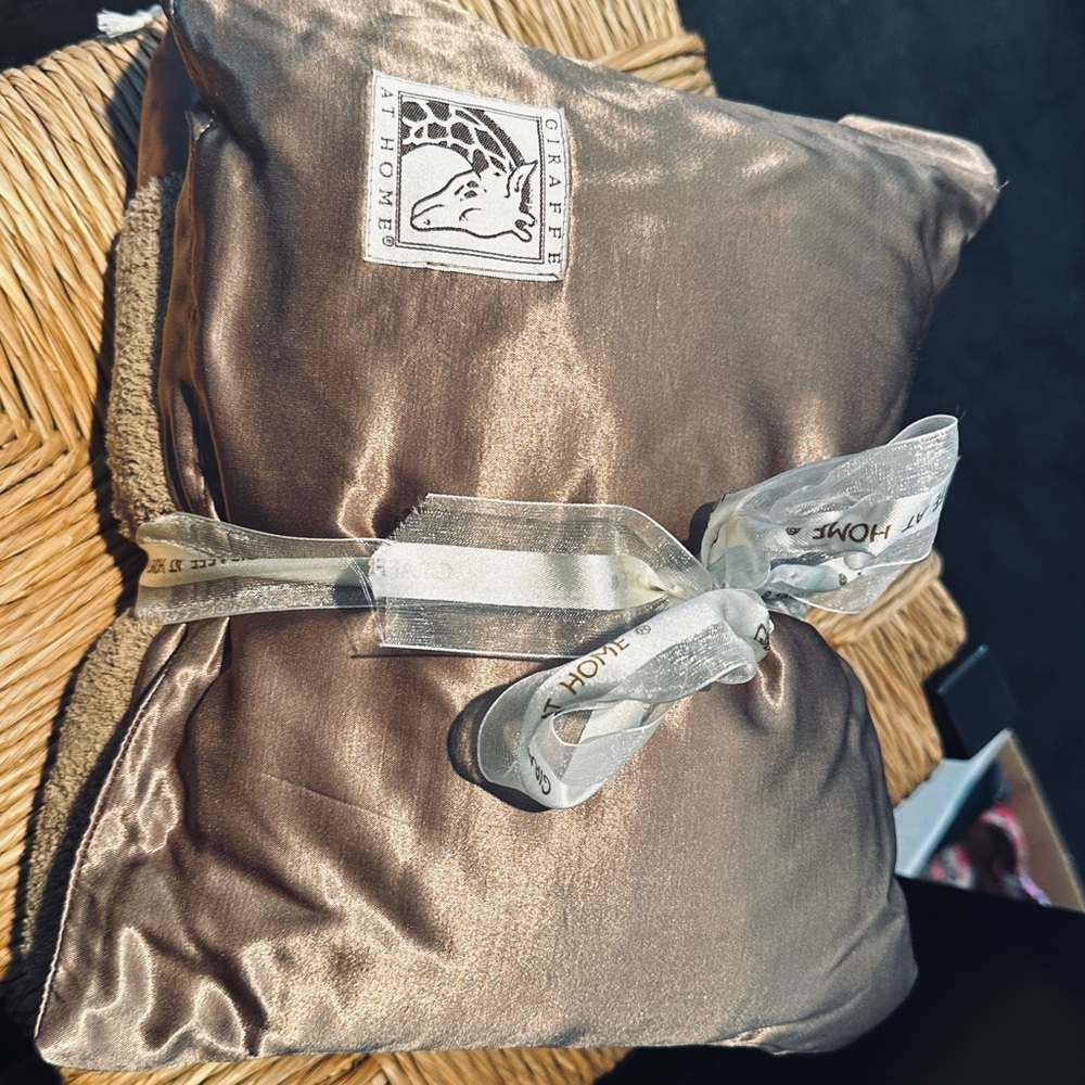 Giraffe at Home Brown travel blanket and pillow